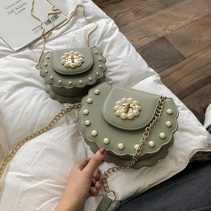 

2022 Summer New Saddle bag High Quality PU Leather Flip bag Women's Designer Handbag Pearl Lock Chain Shoulder Messenger Bags
