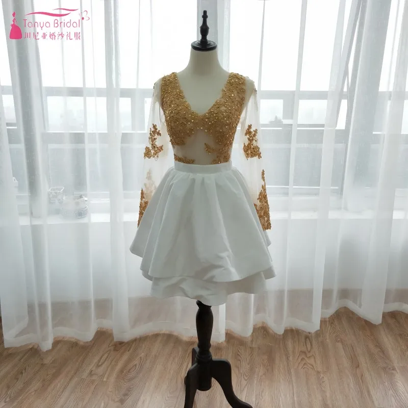 Золотисто белые платья для встречи выпускников с длинным рукавом многоярусные