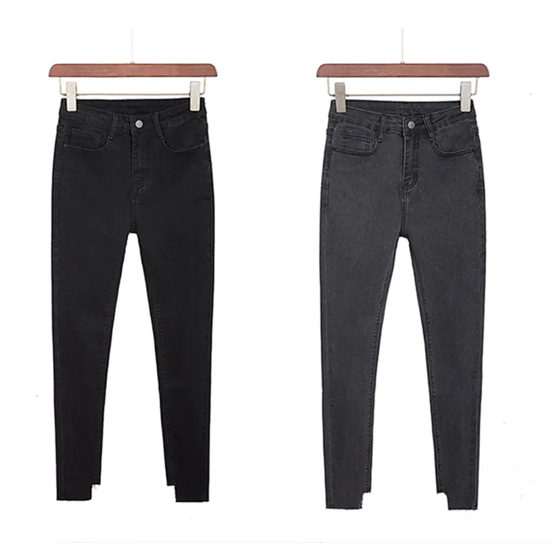 Фото Женские узкие джинсы с высокой талией рваные карандаш серые черные стрейч для