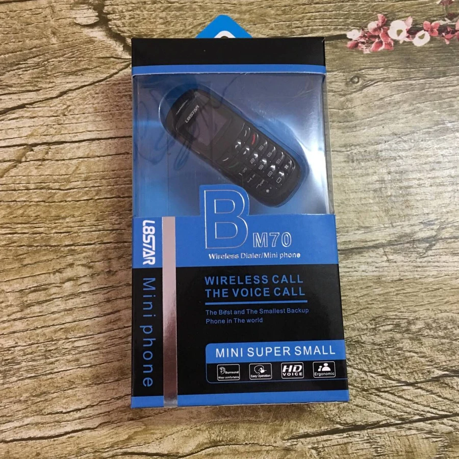 Fsmart BM70 супер маленький мини телефон Волшебная звуковая стерео гарнитура GSM сеть