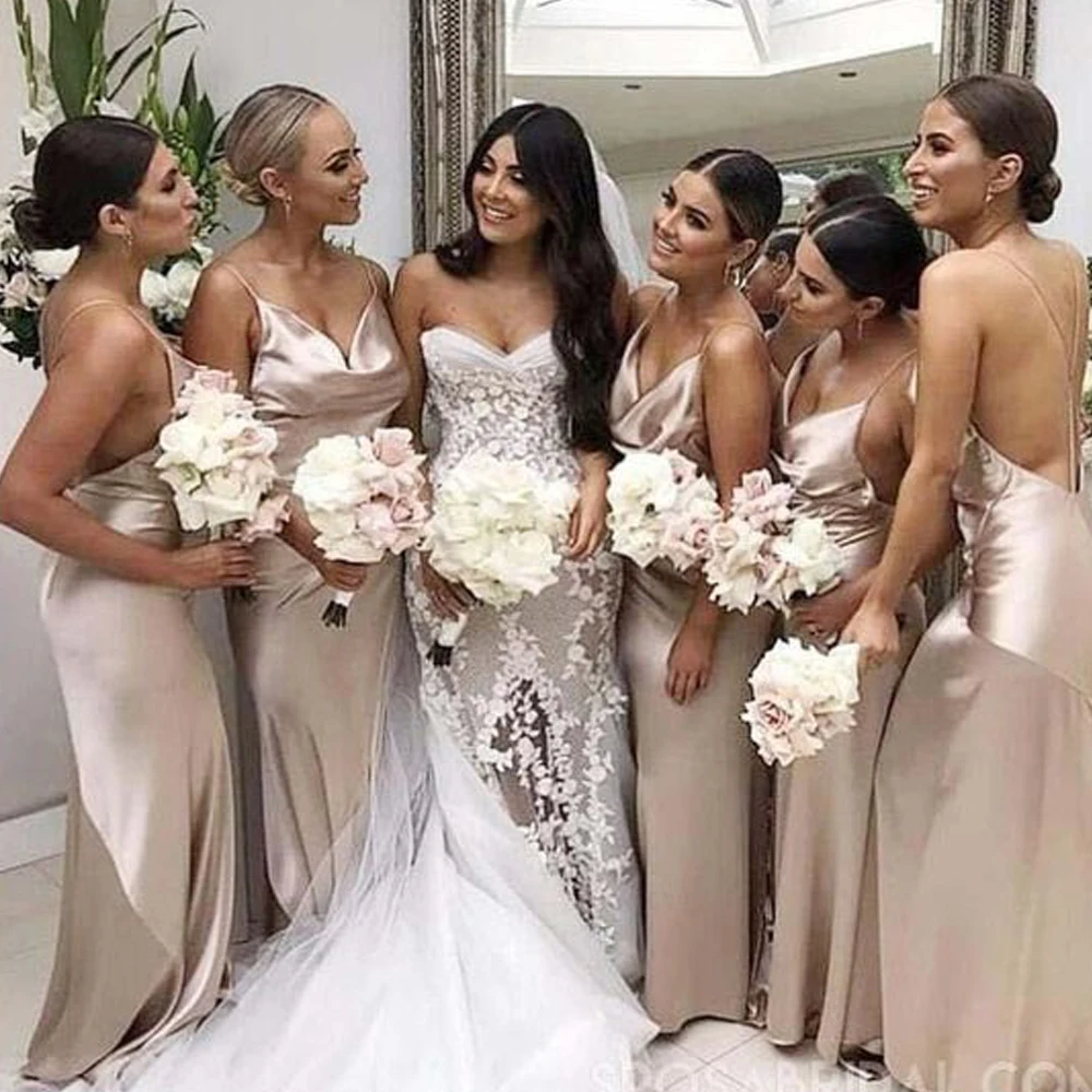 

mermaid bridesmaid dresses champagne spaghetti neckline mermaid pleats floor length wedding guest dresses gowns