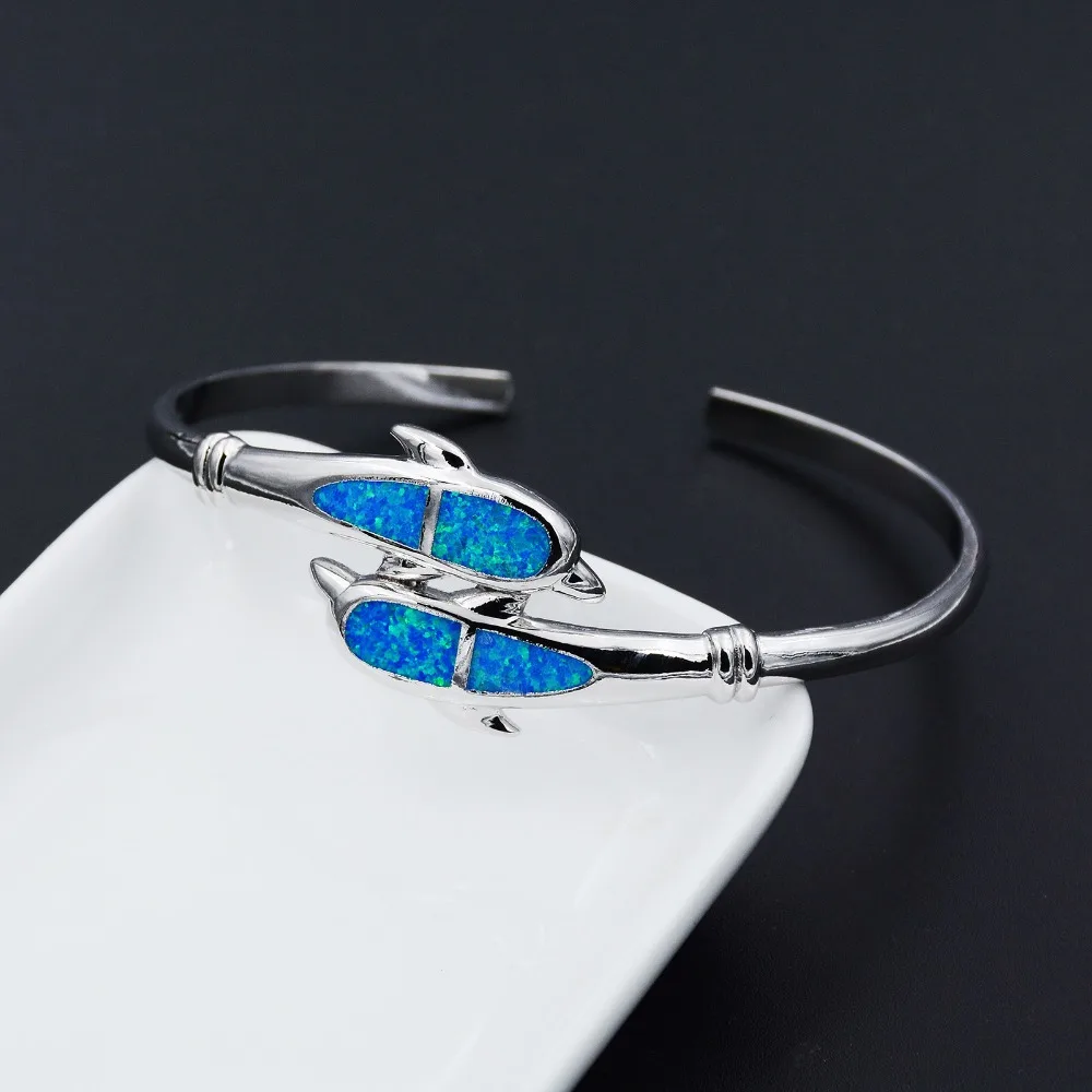 Браслет с двойным дельфином из голубого огненного опала | Украшения и аксессуары