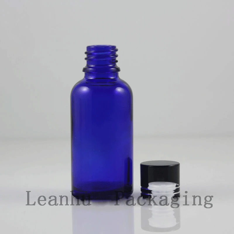 

50ml 100ml For Blue Essential oil Bottle Cosmetic Packaging Refillable Glass oil Bottle Essential oil Glass Container With Lid