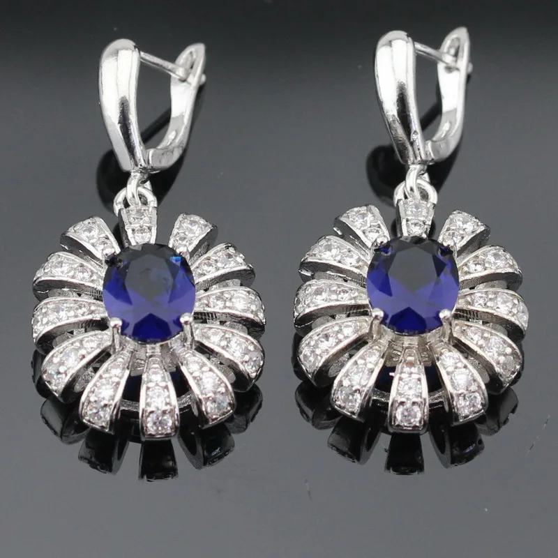 Женский серебряный ювелирный набор в форме цветка темно синий кристалл белый