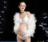 Maternity Pregnant woman photographing costume sexy white feather fur Creative shoot photography photo art mommy clothes