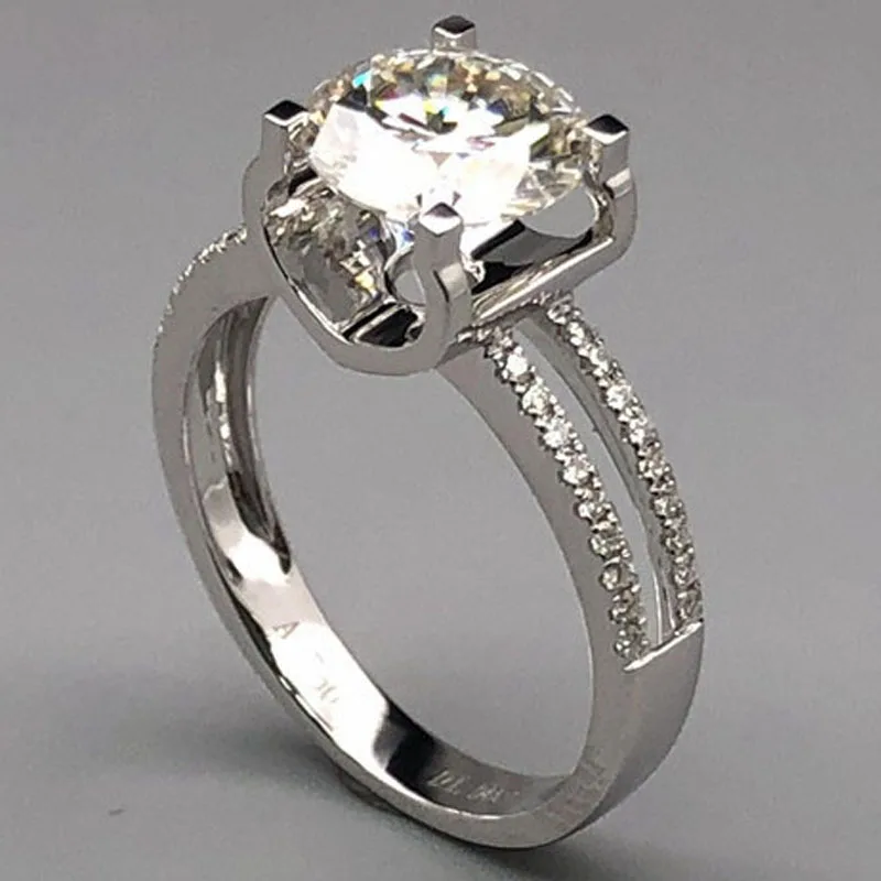 Женское Двухрядное кольцо из 18 каратного белого золота с муассанитом 1 5 карат