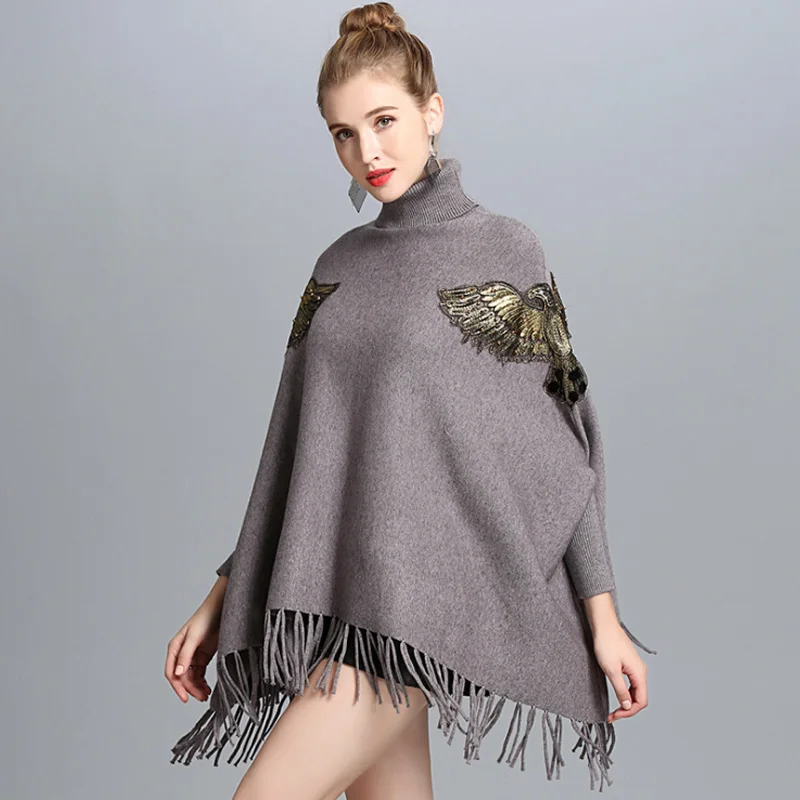 ZDFURS* Autumn Winter Long Knitted Women Eagle Appliqued Sweater Fashion Long Batwing Sleeves High Neck Stole Tassel Poncho