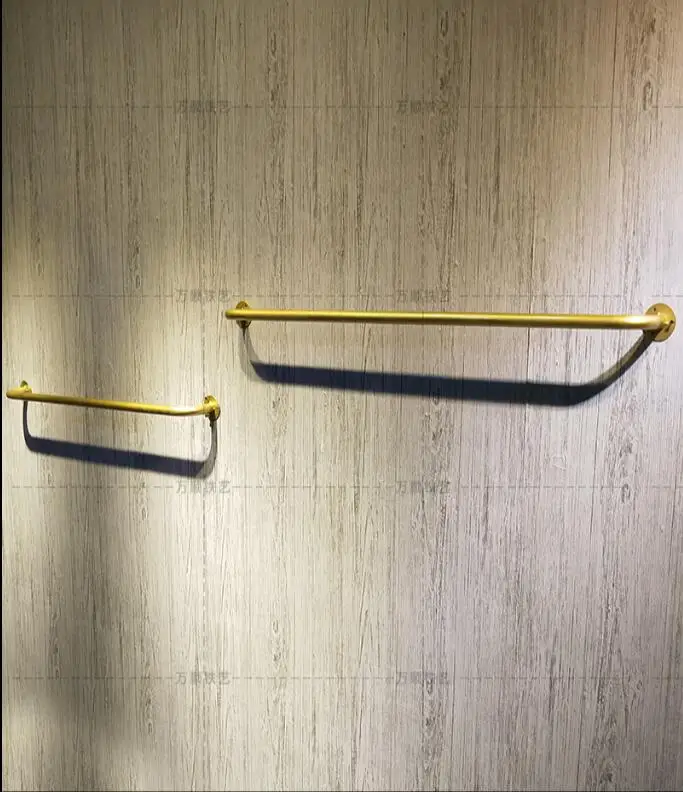 Витрина для магазина одежды верхняя настенная Золотая подвесная вешалка