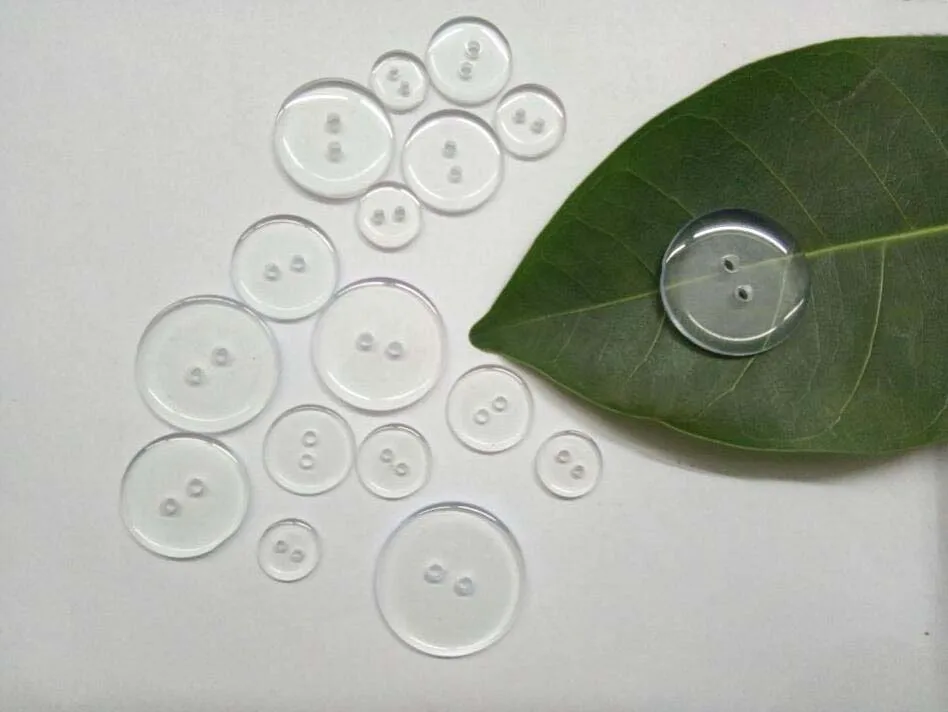 Модные пластиковые прозрачные скрытые пуговицы с двумя отверстиями для шитья 300