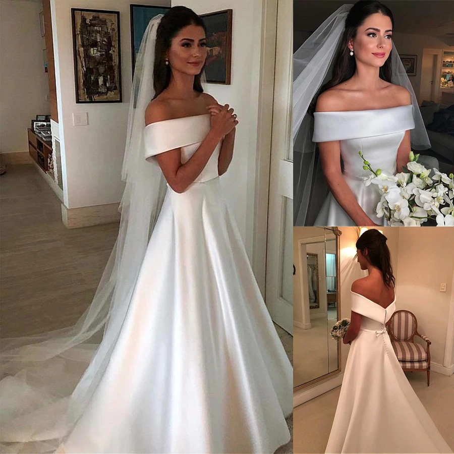 Шикарные атласные свадебные платья а силуэта с открытыми плечами и вырезом