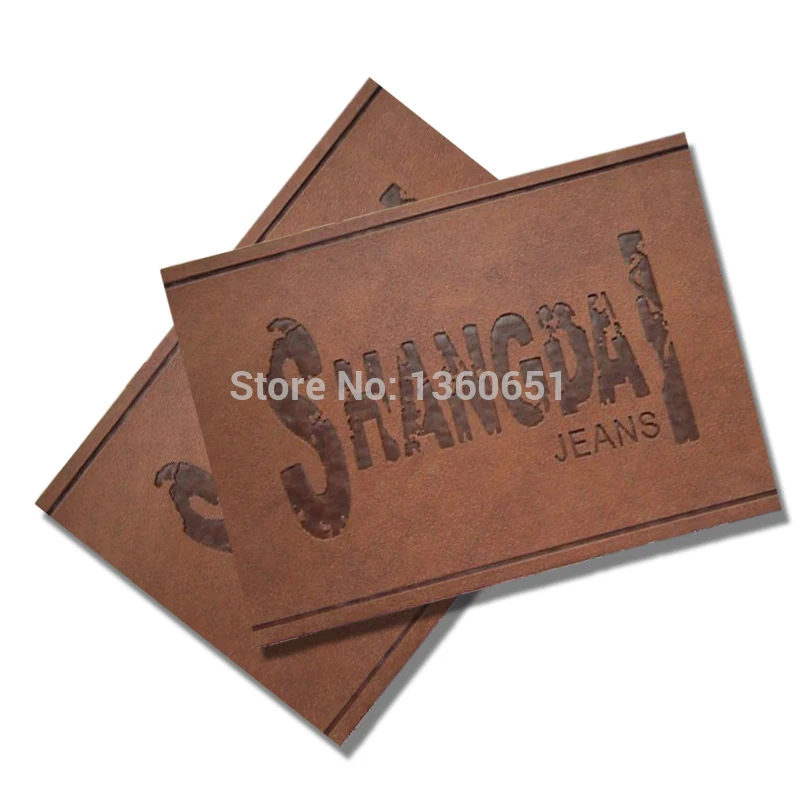 Логотип на заказ съемные тисненые главные кожаные этикетки для джинсов