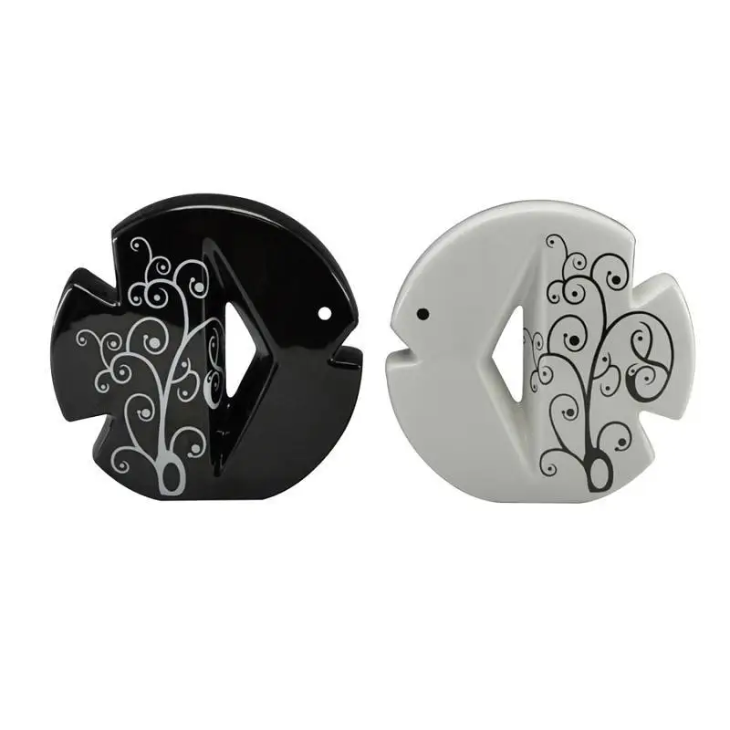 

black and white glazed ceramic fish for wedding decoration