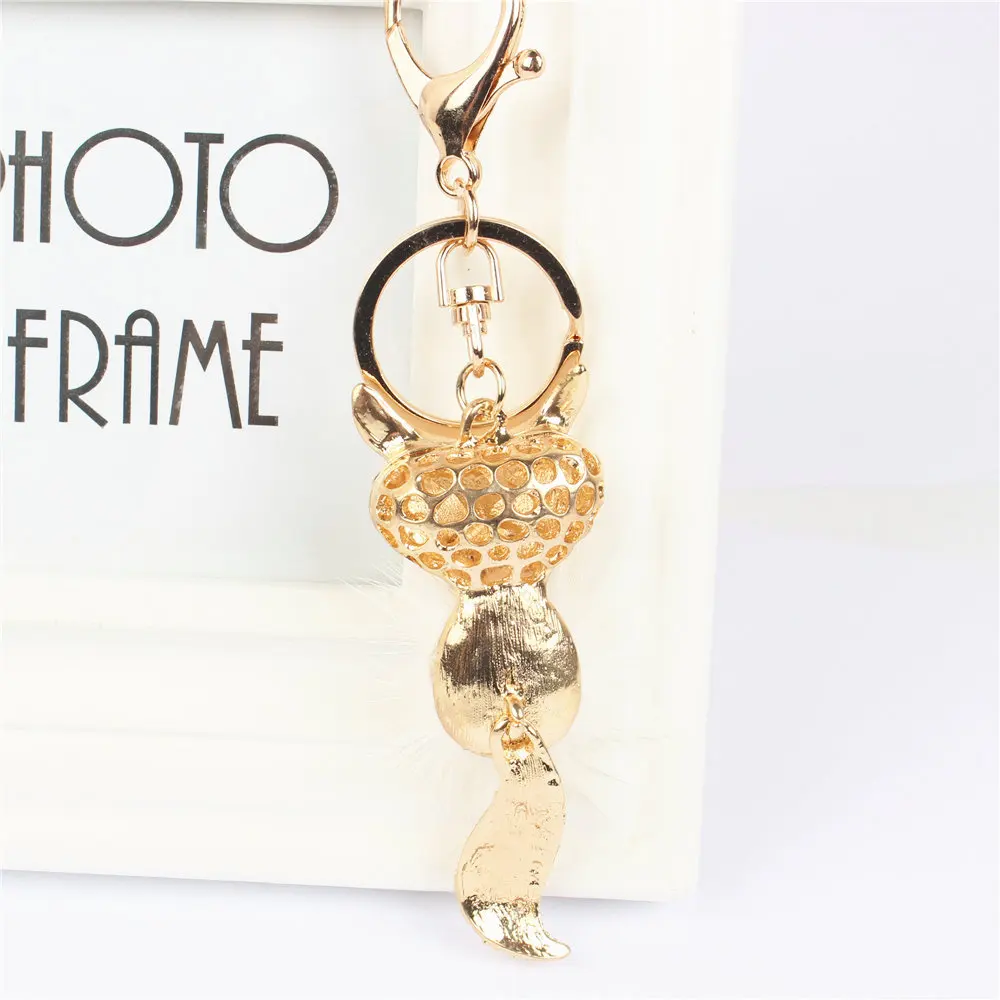 Брелок для ключей с подвеской в виде лисьего пера со стразами|Брелоки| |