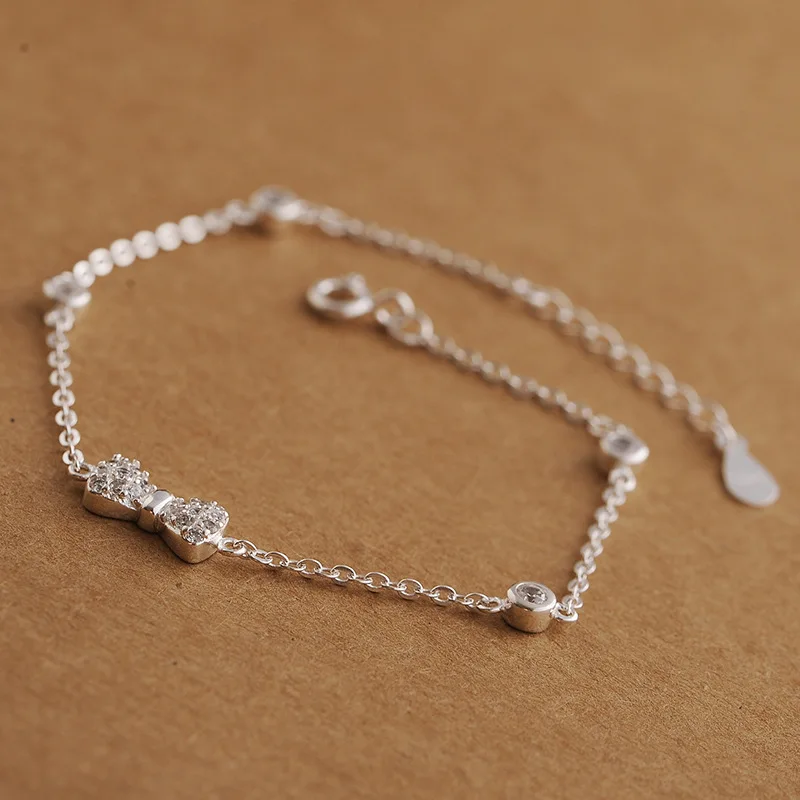 Женский ювелирный комплект из серебра S925 пробы с бантом и кристаллами|crystal