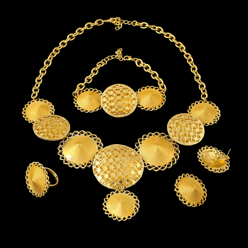 Набор эфиопских украшений Ethlyn золотого цвета. Включает серьги, кольцо и ожерелье. Подходит для свадебных нарядов эритрейских/хабешских женщин. S176.