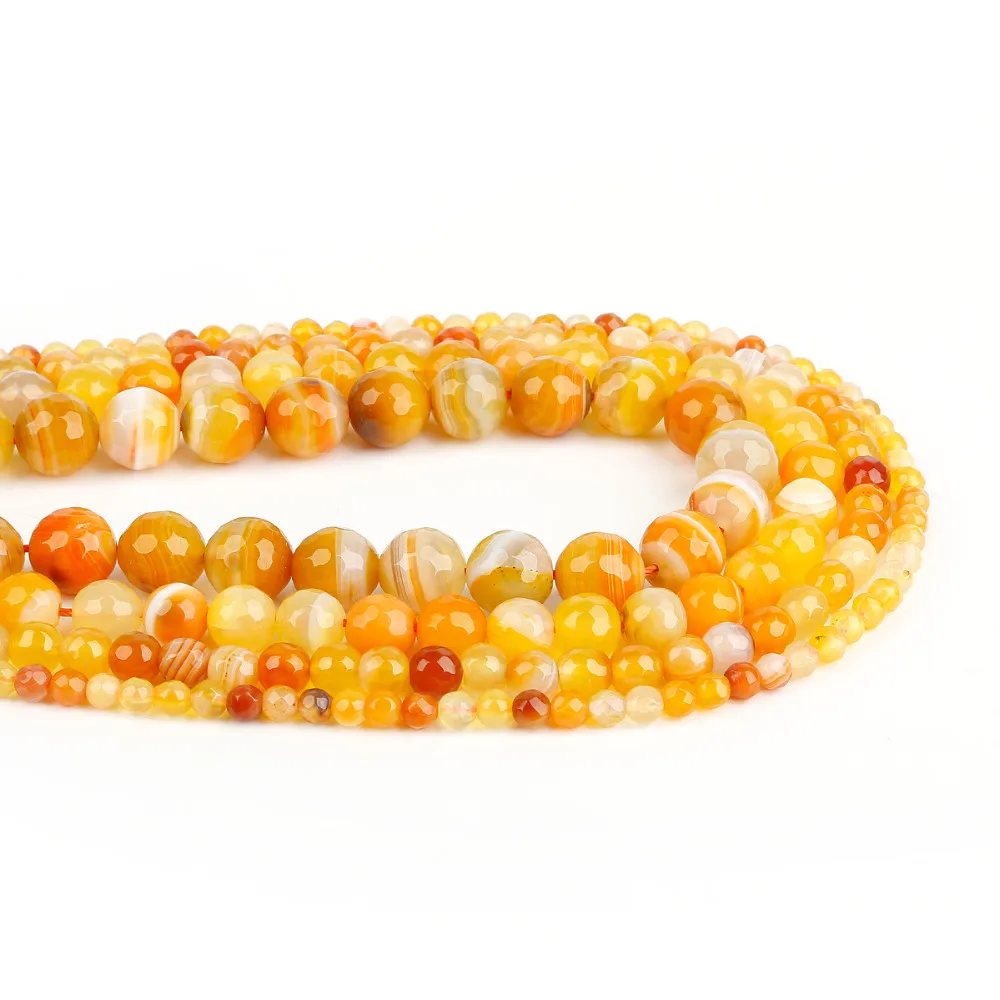 Натуральные окрашенные полосатые граненые оранжевые круглые шарики в полоску