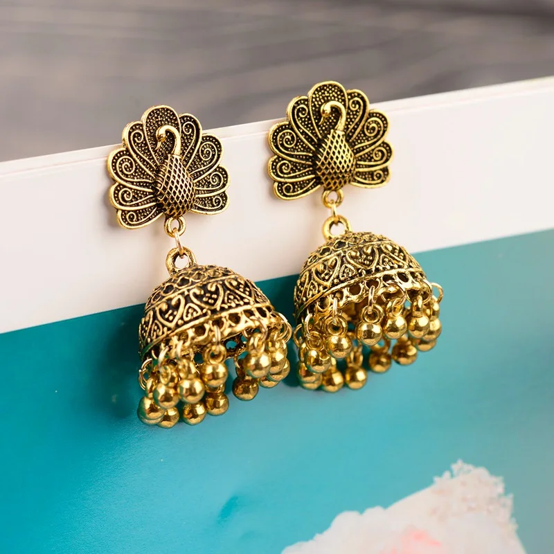

Indian Jhumka Jewelry Small Bells Tassel Drop Earring Bohemia Ethnic Animal Carved Hanging Earrings For Women pendientes