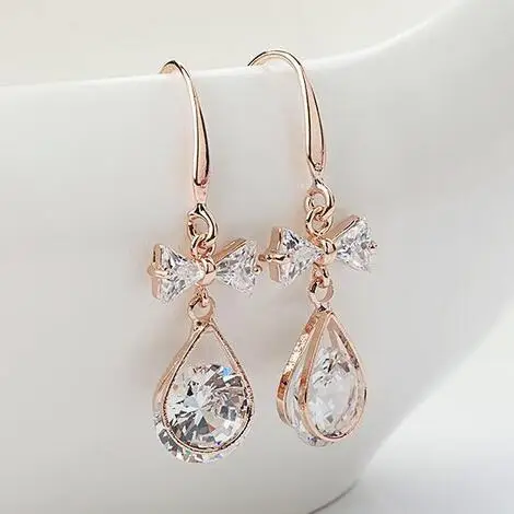 Новые серьги-гвоздики с прозрачным кристаллом жемчугом цирконием бантом сердцем