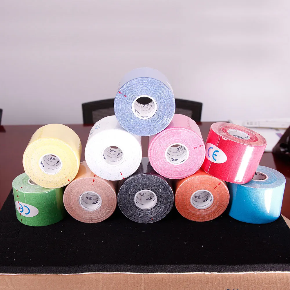 Мышечная кинезиотейпировка 5смх5м DL Бренд (10 рулонов / лот) Горячая распродажа бесплатная доставка + Руководство по использованию + Производитель чистой кинезиологической ленты.