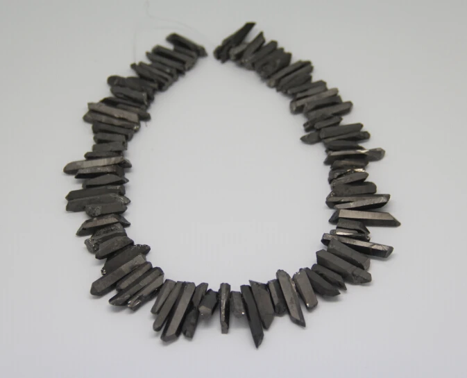 

Approx 90pcs/strand Black Natural Rough Titanium Crystal Quartz Faceted Points Sticks Beads Pendants 3-5x18-35mm