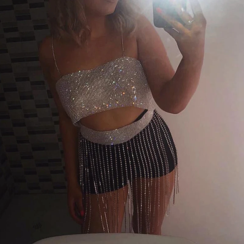 

AKYZO Sparkly Rhinestone Chain Two Piece Set Women Backles Spaghetti Strap Crop Top Camis Hollow Out Crystal Tassel Mini Skirt