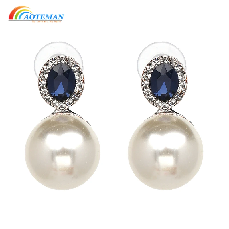 Серьги капли с синими кристаллами и искусственным жемчугом эффектные серьги