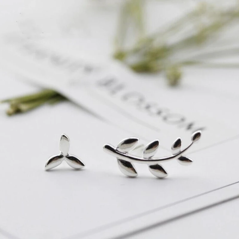 

Sole Memory Simple Leaves Fresh Asymmetrical Personality Silver Color Fashion Female Stud Earrings SEA475