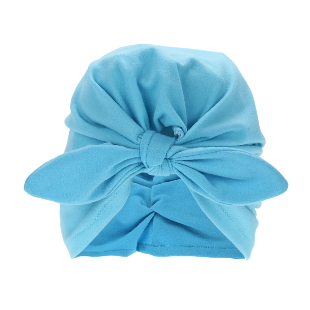 Зимняя детская шапочка теплая мягкая шапка с бантом и кроличьими ушами