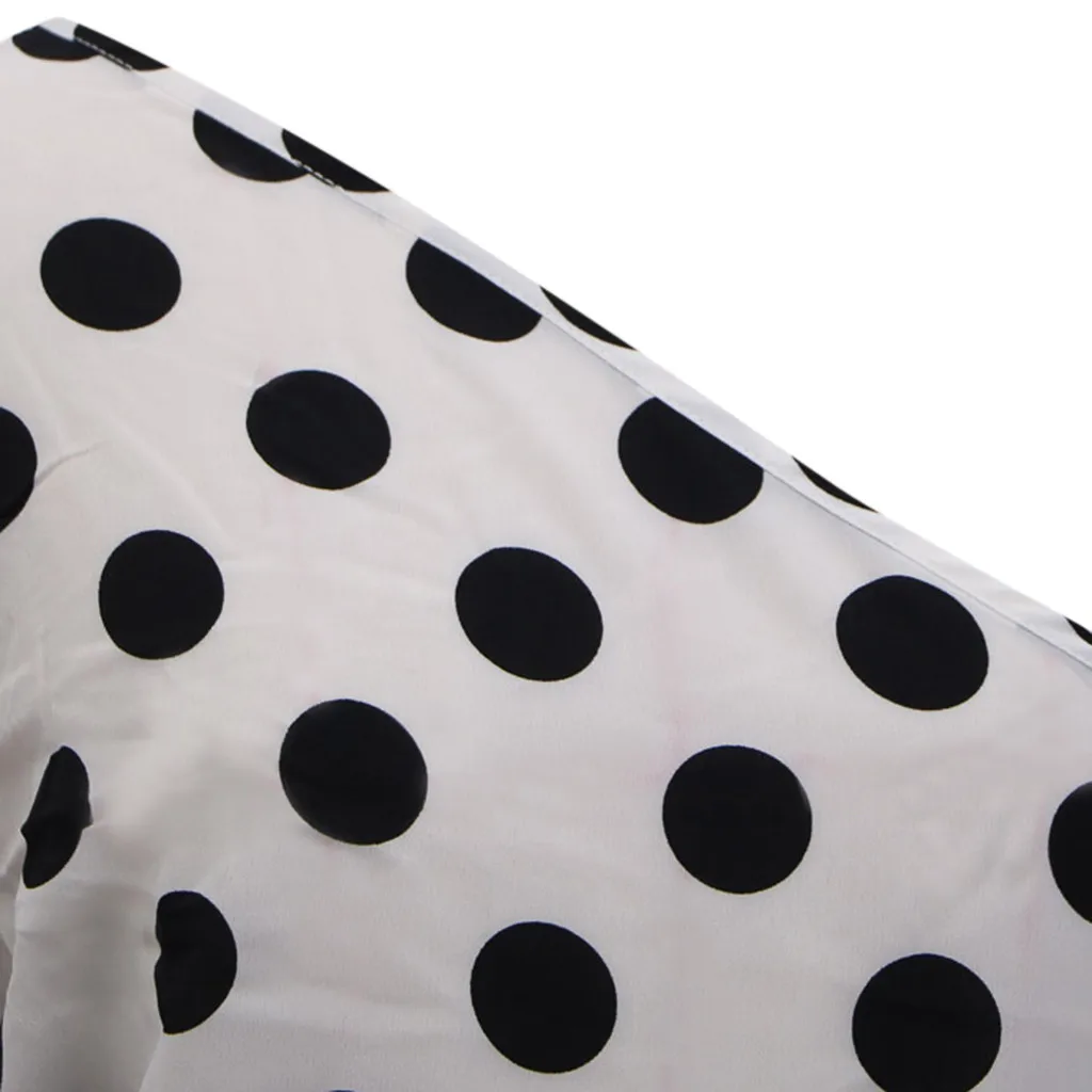 Женское длинное платье в горошек с глубоким v-образным вырезом и открытой спиной