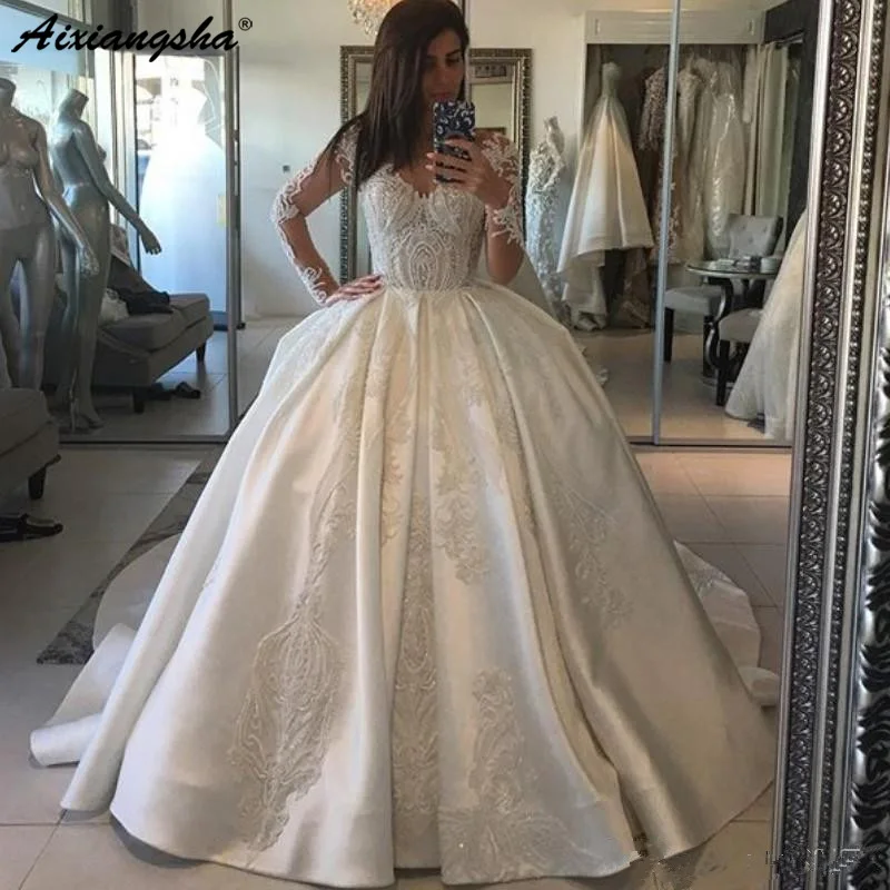 

New Style Wedding Dress Sweetheart Long Sleeves Beads Lace Appliques Dress Dubai Satin Sweep Train Wedding Gowns