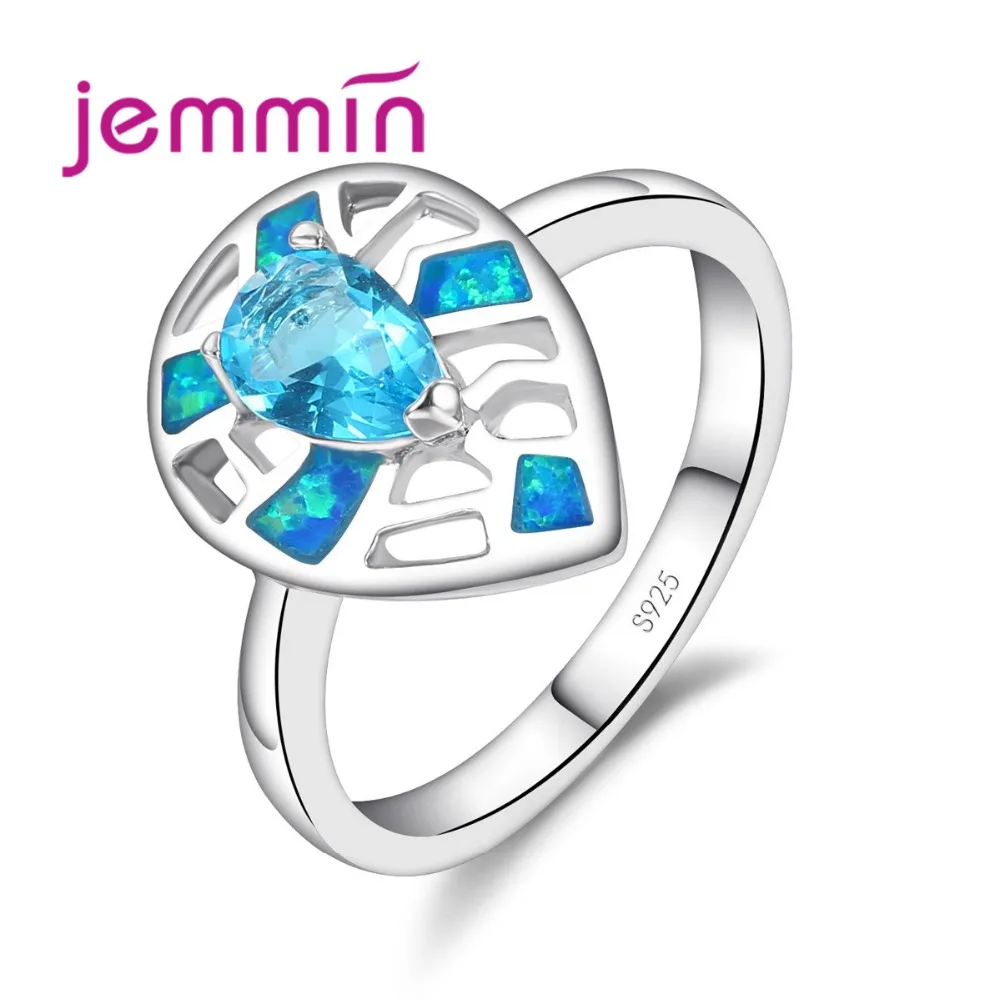 Женское кольцо из серебра 925 пробы с голубым огненным опалом