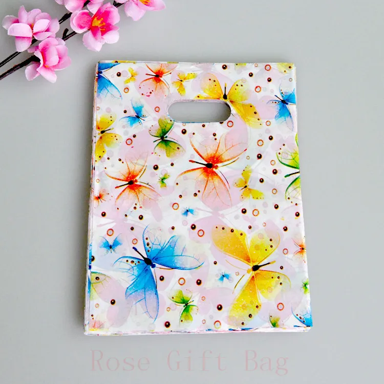 

100pcs/lot 15x20cm Butterfly Design Plastic Gift Bag Wedding Jewelry Gifts Packaging Bags Plastic Shopping Bags With Handle