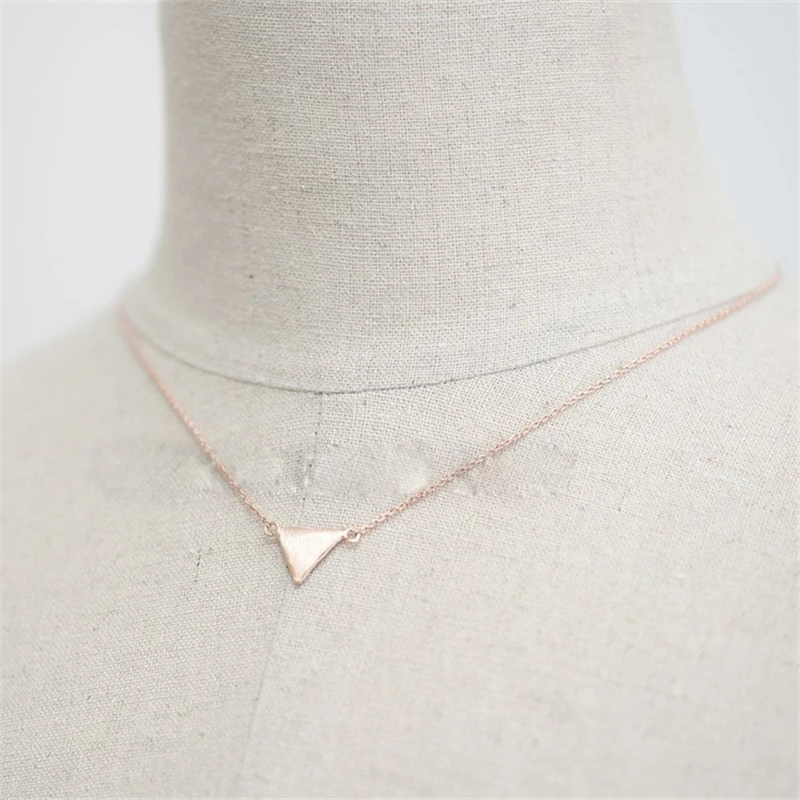 

Fashion triangle pendant necklaces Personality on the surface of wire drawing triangular pendant necklaces
