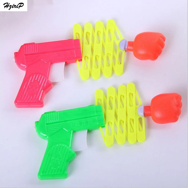 Лидер продаж дешевый выдвижной пистолет с кулаком упругая игрушка смешные
