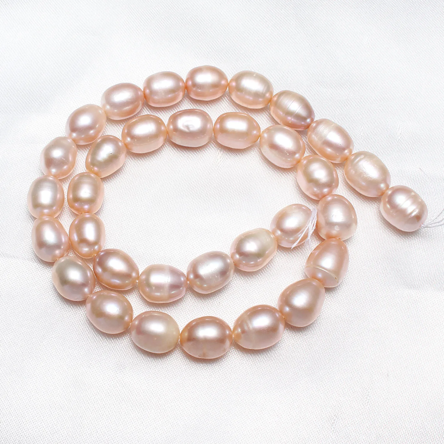 

High Quality Cultured Potato Freshwater Pearl Beads Natural 10-11mm Approx 0.8mm Sold By Strand