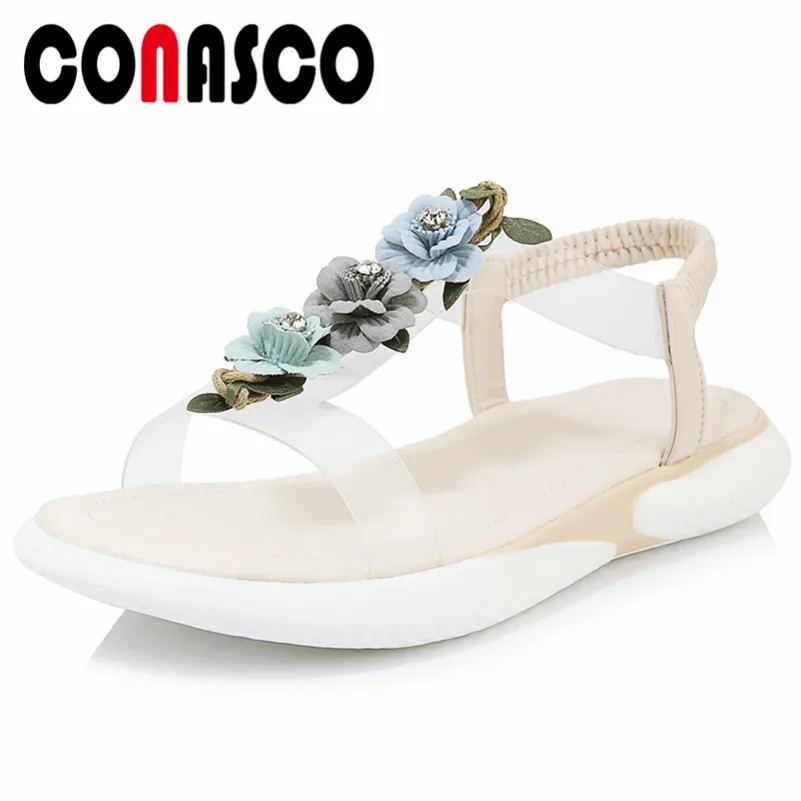 

CONASCO 2021 Summer Round Toe Women Flats Sandals Rome Shallow Elastic Band Flowers Decoration Genuine Leather Basic Shoes Woman