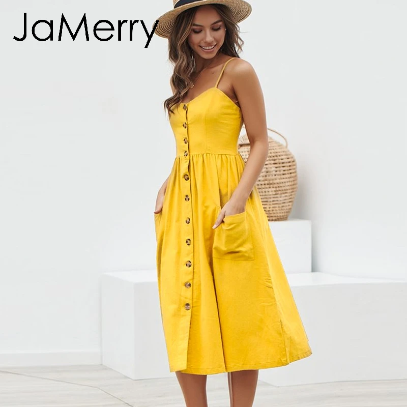 Женское винтажное платье средней длины в горошек на пуговицах с карманами и