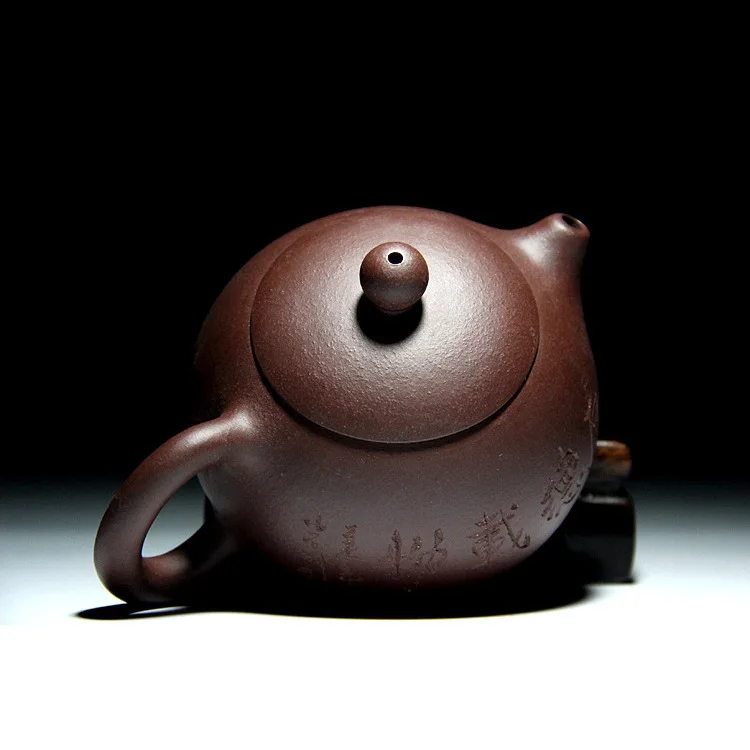 

Manufacturers wholesale Yixing purple clay teapot hot sellers pour Xishi purple clay teapot travel tea gifts by hand