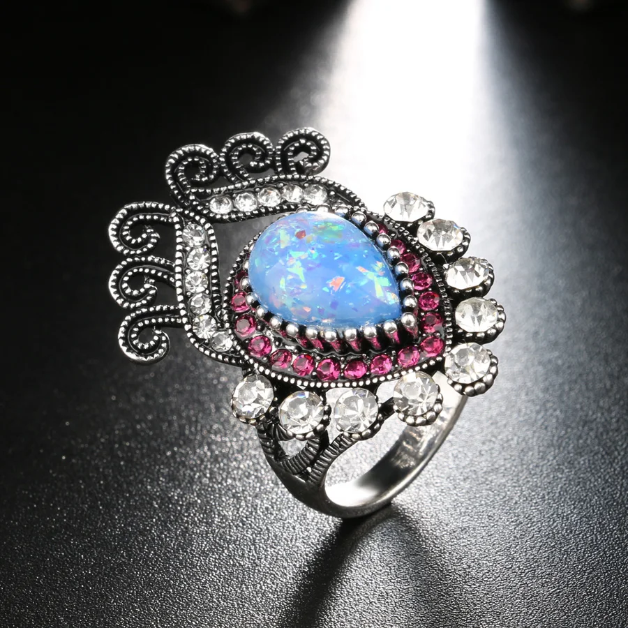 Женские кольца с голубым опалом белый цветок со стразами серебряное кольцо