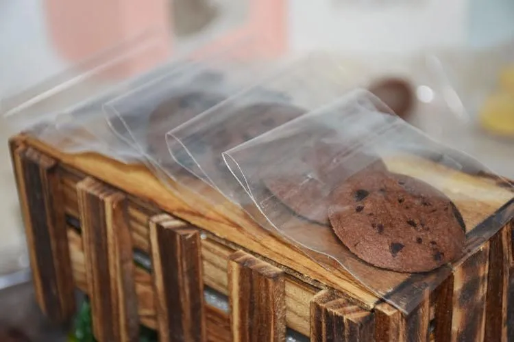 

Свадебный подарочный мешок 7 см * 7 см Бесплатная доставка 1000 шт чистый упаковочный мешок пластиковые печенья упаковка торт макарон мешок