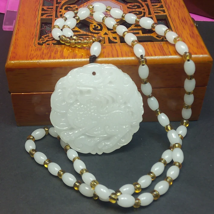 

Genuine natural white jade pendant suet jade kylin Afghanistan auspicious animal kylin jade pendant for men and womenroom Art