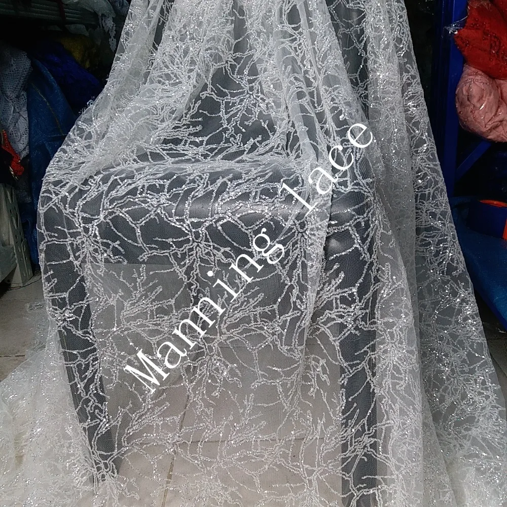 French luxurious wedding dress fabric with flashing lace and glittering high fashion wedding dresses
French luxurious wedding dress fabric with flashing lace and glittering high fashion wedding dresses