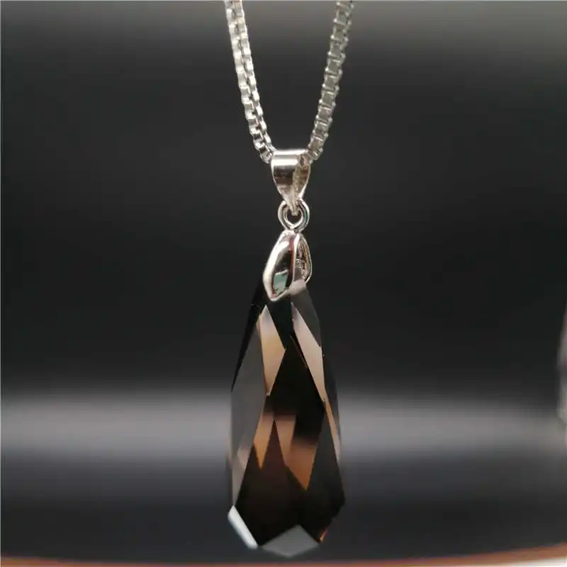 

Natural tea crystal pendant Seven chakra crystal pendulum. Lady. Men pendant
