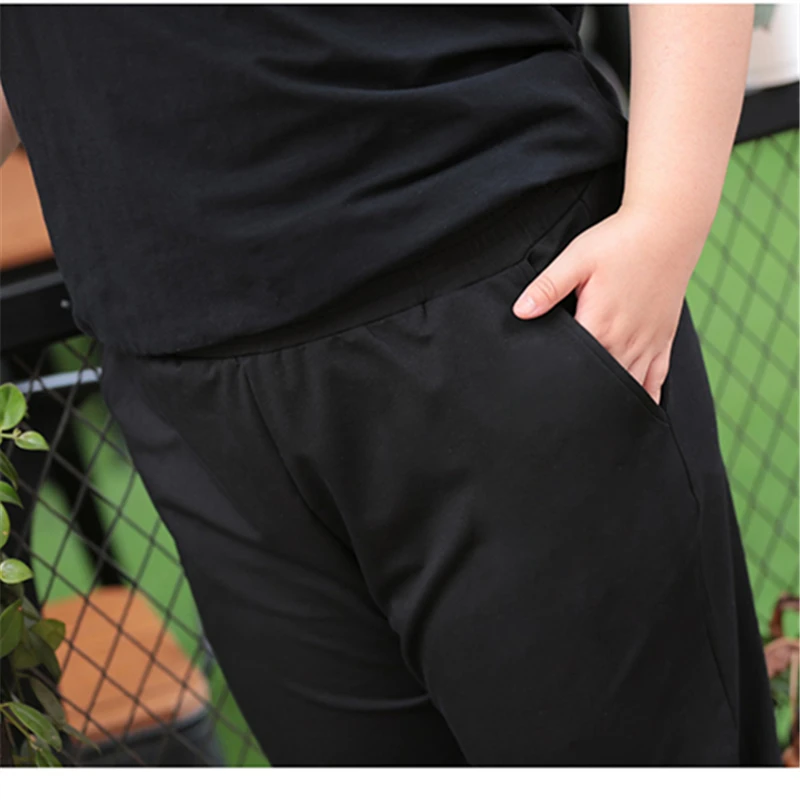 

Extra Large Code Sports Suit Female 2019 Summer New Round Neck T-Shirt + Casual Cropped Trousers Two Sets Of Tide H00284