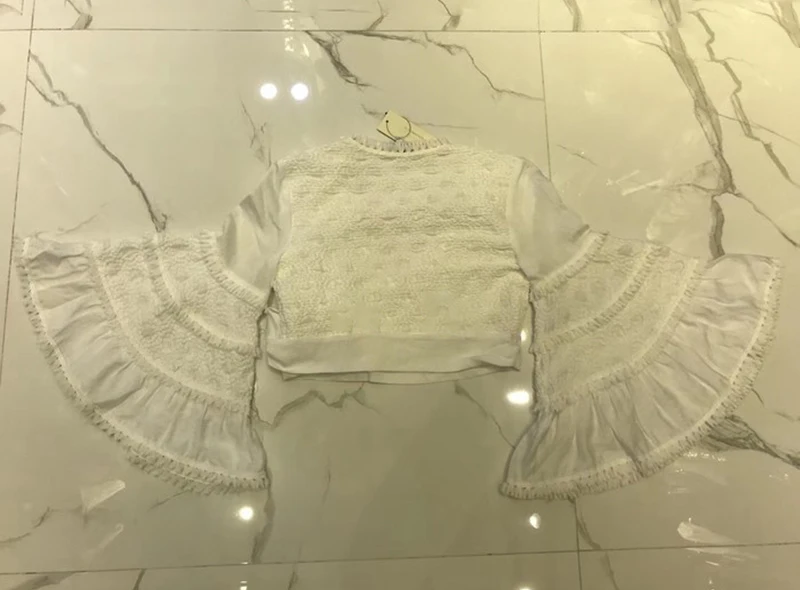 TWOTWINSTYLE Элегантный кисточкой лоскутное женский костюм V образным вырезом расклешенный бандажный укороченный топ Высокая талия узкая юбка средней длины комплект из двух предметов женский