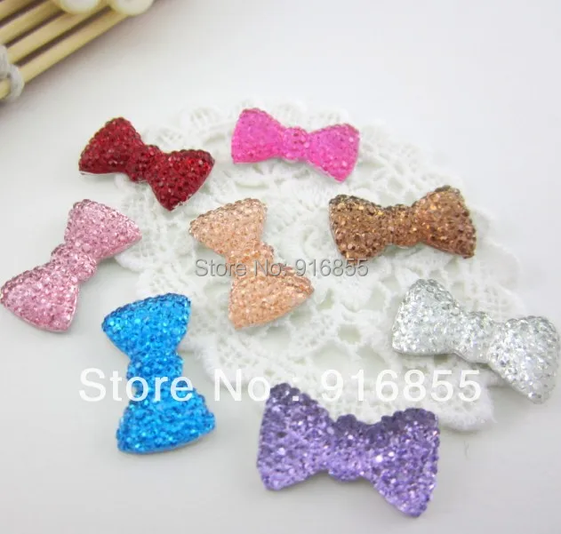 

Free shipping 50pcs/lot 21*12.5mm Pointed bow shape flatback resin rhinestone for DIY decoration