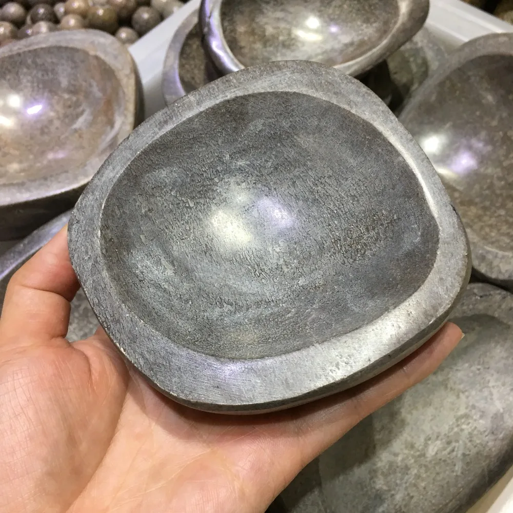 Натуральная пепельница из ископаемого камня в форме кости динозавра