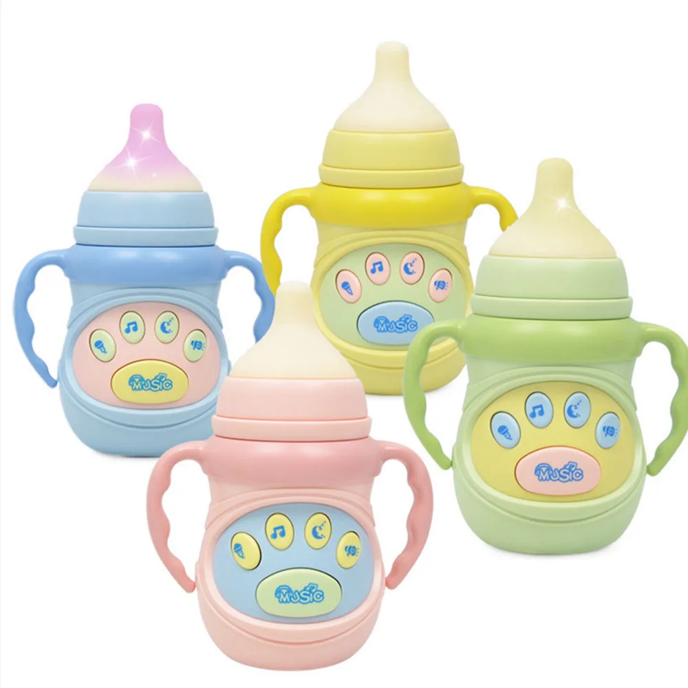 Игрушка детская музыкальная в виде бутылки с молоком | Игрушки и хобби