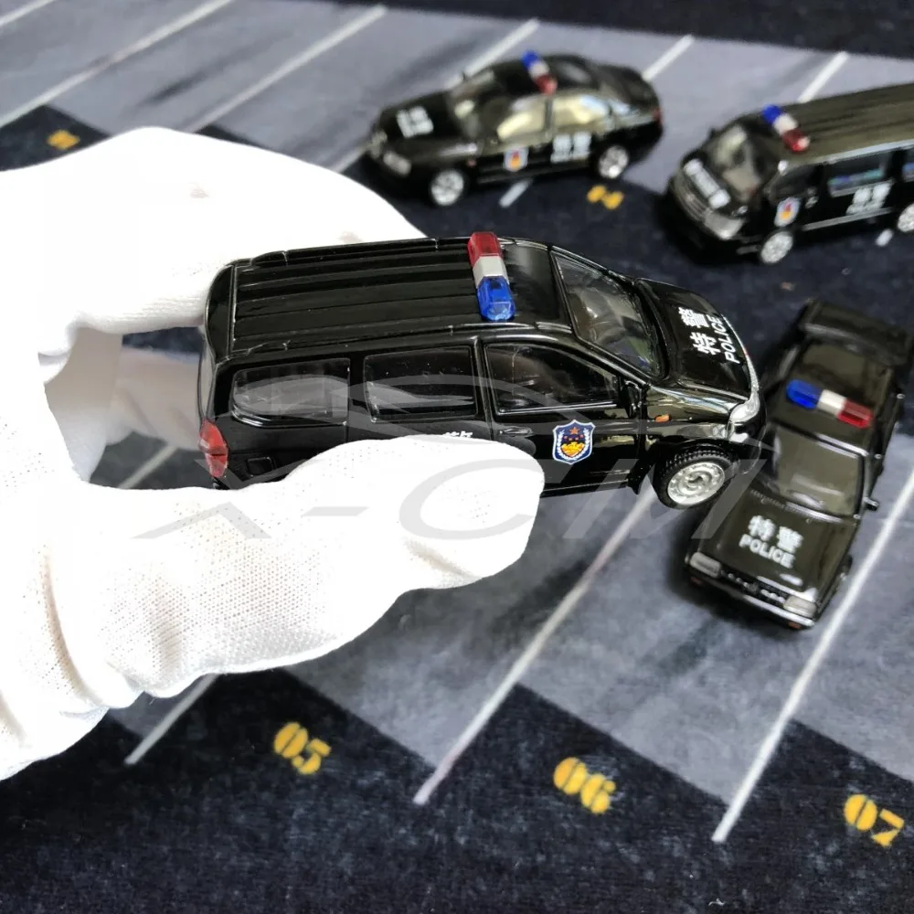 Набор из 4 игрушечных моделей полицейских автомобилей длиной 7-8 см (металлические