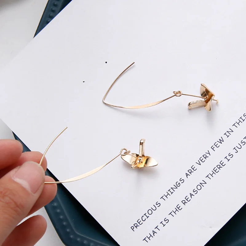 Серьги капельки женские из золотого сплава с бумажным краном и птичкой серьги